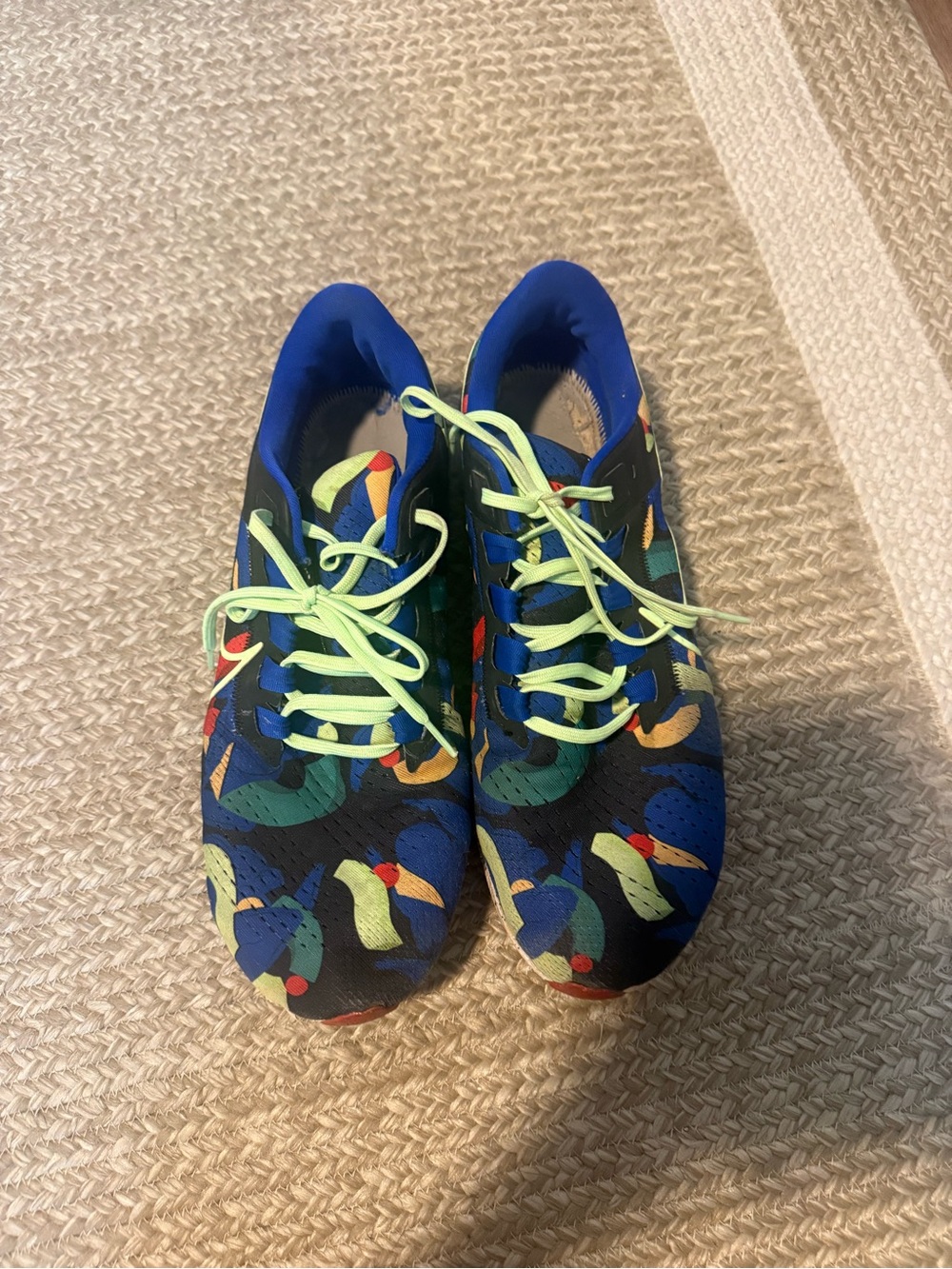 Nike Blue Athletic Shoes with Lime Laces and Multicolor Print